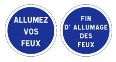 French road signs instructing drivers to turn on headlights (‘Allumez Vos Feux’) and indicating the end of the requirement (‘Fin d’Allumage des Feux’).
