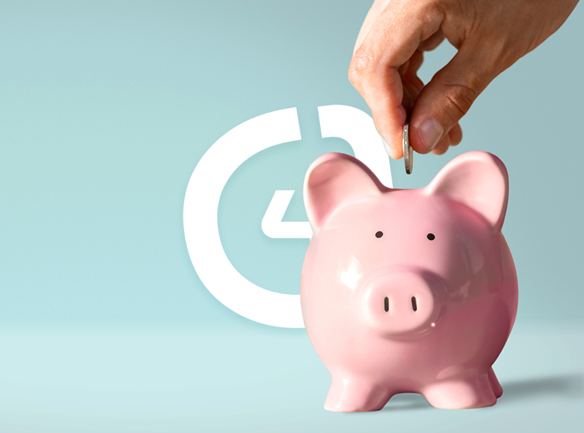 Person saving money into a pink piggybank.